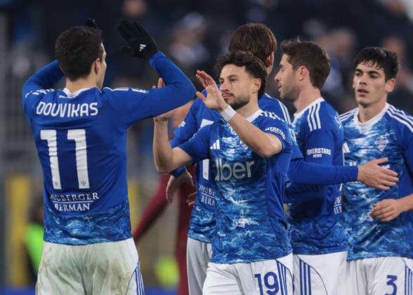 Como, Italy, 24th January 2026. Nicolas Kuhn of Como 1907 celebrates with team mates after scoring to give the hosts a 5-0 lead during the Como 1907 vs Torino Serie A match at Stadio Giuseppe Sinigaglia, Como. Picture credit should read: Jonathan Moscrop Sportimage EDITORIAL USE ONLY. No use with unauthorised audio, video, data, fixture lists, club league logos or live services. Online in-match use limited to 120 images, no video emulation. No use in betting, games or single club league player publications. SPI_061_JM_COMO_TORO_ SPI-4418-0061