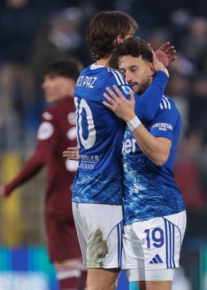 Como, Italy, 24th January 2026. Nicolas Kuhn of Como 1907 celebrates with team mate Nico Paz after scoring to give the hosts a 5-0 lead during the Como 1907 vs Torino Serie A match at Stadio Giuseppe Sinigaglia, Como. Picture credit should read: Jonathan Moscrop Sportimage EDITORIAL USE ONLY. No use with unauthorised audio, video, data, fixture lists, club league logos or live services. Online in-match use limited to 120 images, no video emulation. No use in betting, games or single club league player publications. SPI_064_JM_COMO_TORO_ SPI-4418-0064
