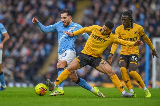 Manchester City v Wolverhampton Wanderers Premier League Rayan Cherki of Manchester City and Andre of Wolverhampton Wanderers during the Premier League match at the Etihad Stadium, Manchester 24 01 2026 UK Newspapers OUT Copyright: xKarlxVallantinex FIL-22858-0048