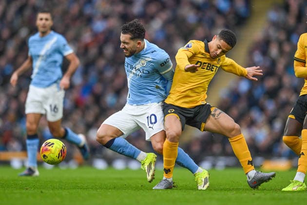Manchester City v Wolverhampton Wanderers Premier League Rayan Cherki of Manchester City and Andre of Wolverhampton Wanderers during the Premier League match at the Etihad Stadium, Manchester 24 01 2026 UK Newspapers OUT Copyright: xKarlxVallantinex FIL-22858-0049