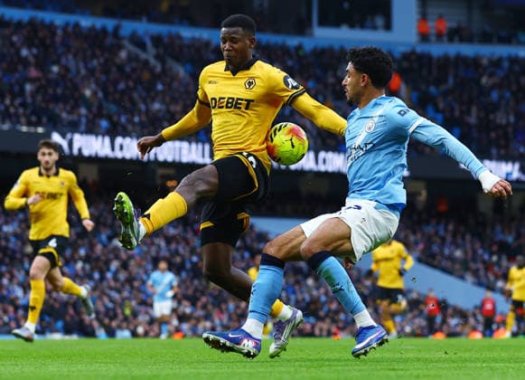 Omar Marmoush of Manchester City and Yerson Mosquera of Wolverhampton Wanderers with no penalty kick after a VAR pitch side review Manchester City v Wolverhampton Wanderers, Premier League, Football, Etihad Stadium, Manchester, UK - 24 Jan 2026Manchester Etihad Stadium United Kingdom EDITORIAL USE ONLY No use with unauthorised audio, video, data, fixture lists, club league logos or live services. Online in-match use limited to 120 images, no video emulation. No use in betting, games or single club league player publications. Copyright: xMattxWest Shutterstockx 16425986ab