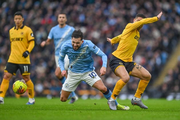 Manchester City v Wolverhampton Wanderers Premier League Rayan Cherki of Manchester City and Andre of Wolverhampton Wanderers during the Premier League match at the Etihad Stadium, Manchester 24 01 2026 UK Newspapers OUT Copyright: xKarlxVallantinex FIL-22858-0051