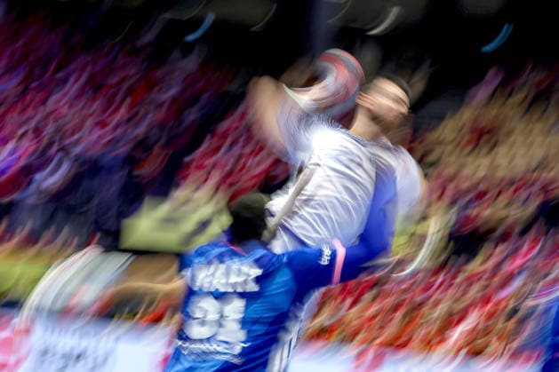 24 01 2026, Handball, Men s EHF EURO 2026, France Portugal, Jyske Bank Boxing in Herning, Denmark, Main Round Feature Miguel Jose Soares Neves Portugal 20 throws on goal against Dylan Nahi France 31 dynamic dynamic slow shutter Denmark