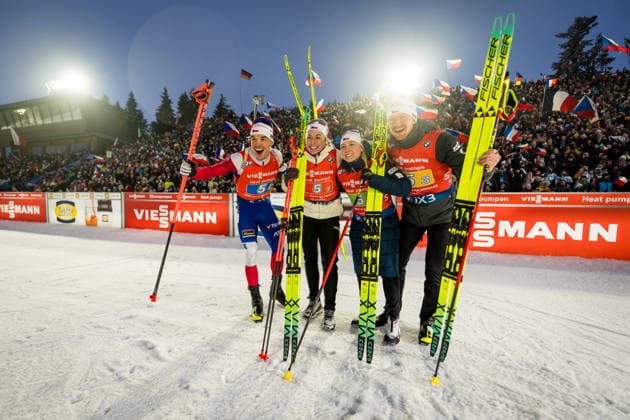 Czech from left Michal Krcmar, Vitezslav Hornig, Tereza Vobornikova, Jessica Jislova celebrate third place after the Biathlon World Cup race (mixed relay), Nove Mesto na Morave, Czech Republic, January 24, 2026. (CTKxPhoto JaroslavxSvoboda) CTKPhotoP2026012406241  CTKPhotoP2026012406241