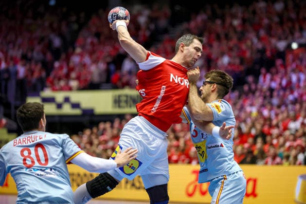 24 01 2026, Handball, Men s EHF EURO 2026, Denmark Spain, Jyske Bank Boxing in Herning, Denmark, Main Round Rasmus Lauge Schmidt Denmark 11 in a duel against Antonio Serradilla Cuenca Espania 05 Denmark