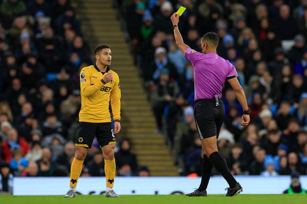 Manchester City v Wolverhampton Wanderers, Premier League Joao Gomes (8) of Wolverhampton Wanderers is shown a yellow card by referee Farai Hallam during the Premier League match between Manchester City and Wolverhampton Wanderers at the Etihad Stadium, Manchester, UK on 24 January 2026. Manchester Etihad Stadium Manchester UK Editorial use only DataCo restrictions apply See www.football-dataco.com , Copyright: xConorxMolloyx PSI-23610-0114