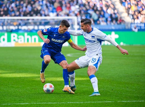 Marvin Wanitzek Karlsruher SC and Paul Seguin Hertha BSC battle for the ball during the 2 Bundesliga match between Karlsruher SC and Hertha BSC at BBBank Wildpark on January 24, 2026 in Karlsruhe, Germany Germany Photo by Silas Schüller DeFodi Images Marvin Wanitzek Karlsruher SC and Paul Seguin Hertha BSC battle for the ball during the 2 Bundesliga match between Karlsruher SC and Hertha BSC at BBBank Wildpark on January 24, 2026 in Karlsruhe, Germany Photo by Silas Schüller DeFodi Images DFB DFL REGULATIONS PROHIBIT ANY USE OF PHOTOGRAPHS AS IMAGE SEQUENCES AND OR QUASI VIDEO Photo by Silas Schueller DeFodi Images
