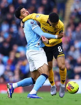 Omar Marmoush of Manchester City and Joao Gomes of Wolverhampton Wanderers Manchester City v Wolverhampton Wanderers, Premier League, Football, Etihad Stadium, Manchester, UK - 24 Jan 2026Manchester Etihad Stadium United Kingdom EDITORIAL USE ONLY No use with unauthorised audio, video, data, fixture lists, club league logos or live services. Online in-match use limited to 120 images, no video emulation. No use in betting, games or single club league player publications.  Copyright: xMattxWest Shutterstockx 16425986be