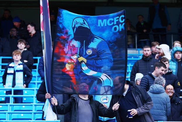 A Manchester City fan displays a banner Manchester City v Wolverhampton Wanderers, Premier League, Football, Etihad Stadium, Manchester, UK - 24 Jan 2026Manchester Etihad Stadium United Kingdom EDITORIAL USE ONLY No use with unauthorised audio, video, data, fixture lists, club league logos or live services. Online in-match use limited to 120 images, no video emulation. No use in betting, games or single club league player publications.  Copyright: xMattxWest Shutterstockx 16425986cw