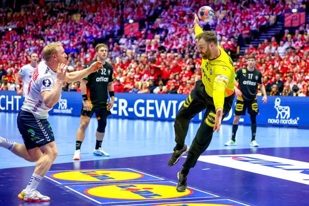 24 01 2026, Handball, Men s EHF EURO 2026, Germany Norway, Jyske Bank Boxen in Herning, Denmark, Main Round Andreas Wolff Germany 33 making a save against Martin Hernes Hovde Norway 25 Denmark