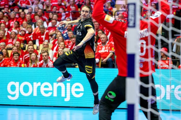 24 01 2026, Handball, Men s EHF EURO 2026, Germany Norway, Jyske Bank Boxen in Herning, Denmark, Main Round Juri Knorr Germany 15 throws the ball at the goal of Torbjorn Sittrup Bergerud Norway 30 Denmark