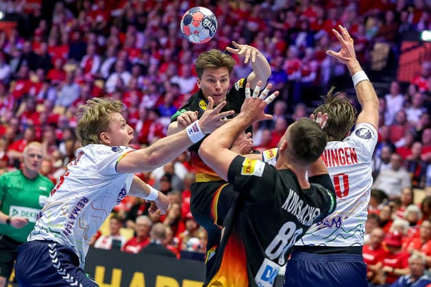 24 01 2026, Handball, Men s EHF EURO 2026, Germany Norway, Jyske Bank Boxing in Herning, Denmark, Main Round Nils Lichtlein Germany 03 in a duel against Martin Hernes Hovde Norway 25 Vetle Ronningen Norway 10 Denmark