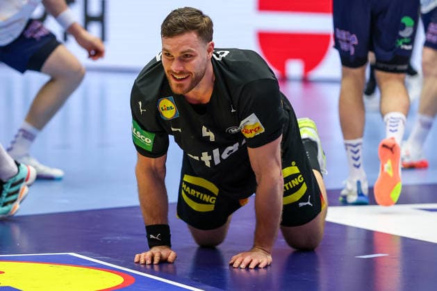 24 01 2026, Handball, Men s EHF EURO 2026, Germany Norway, Jyske Bank Boxen in Herning, Denmark, Main Round Johannes Golla Germany 04 kneels on the pitch Denmark