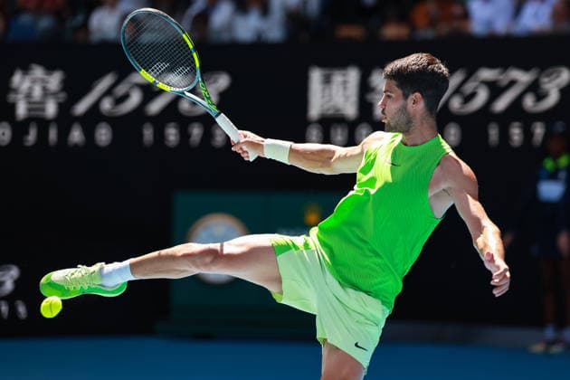 Carlos Alcaraz ESP kicks the ball in best soccer style,curious, Australian Open 2026, Melbourne Park, Melbourne, Victoria, Australia Copyright: xJuergenxHasenkopfx