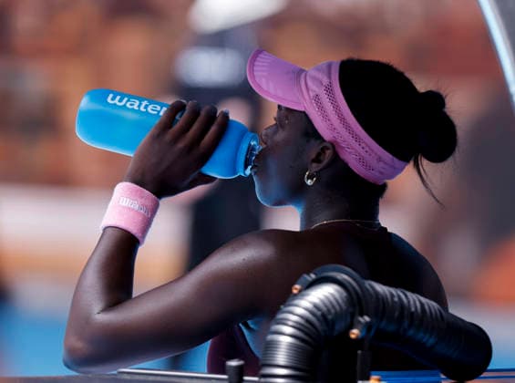 (260125) -- MELBOURNE, Jan. 25, 2026 -- Victoria Mboko drinks water during the women s singles 4th round match between Aryna Sabalenka of Belarus and Victoria Mboko of Canada at the Australian Open tennis tournament in Melbourne, Australia, Jan. 25, 2026. ) (SP)AUSTRALIA-MELBOURNE-TENNIS-AUSTRALIAN OPEN-WOMEN S SINGLES MaxPing 