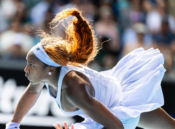 (260125) -- MELBOURNE, Jan. 25, 2026 -- Coco Gauff serves during the women s singles 4th round match between Coco Gauff of the United States and Karolina Muchova of the Czech Republic at the Australian Open tennis tournament in Melbourne, Australia, Jan. 25, 2026. (Photo by Xinhua) (SP)AUSTRALIA-MELBOURNE-TENNIS-AUSTRALIAN OPEN-WOMEN S SINGLES HuxJingchen 