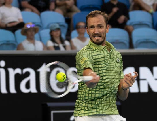 (260125) -- MELBOURNE, Jan. 25, 2026 -- Daniil Medvedev hits a return during the men s singles 4th round match between Daniil Medvedev of Russia and Learner Tien of the United States at the Australian Open tennis tournament in Melbourne, Australia, Jan. 25, 2026. (Photo by Xinhua) (SP)AUSTRALIA-MELBOURNE-TENNIS-AUSTRALIAN OPEN-MEN S SINGLES HuxJingchen 