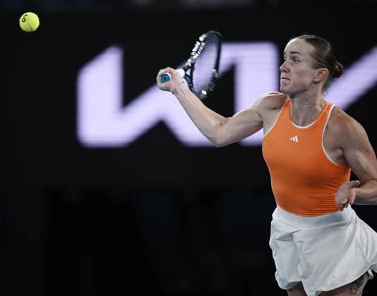 (260125) -- MELBOURNE, Jan. 25, 2026 -- Elina Svitolina hits a return during the women s singles 4th round match between Elina Svitolina of Ukraine and Mirra Andreeva of Russia at the Australian Open tennis tournament in Melbourne, Australia, Jan. 25, 2026. (Photo by Xinhua) (SP)AUSTRALIA-MELBOURNE-TENNIS-AUSTRALIAN OPEN-WOMEN S SINGLES WangxShen 