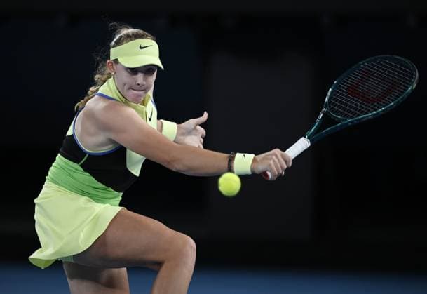 (260125) -- MELBOURNE, Jan. 25, 2026 -- Mirra Andreeva hits a return during the women s singles 4th round match between Elina Svitolina of Ukraine and Mirra Andreeva of Russia at the Australian Open tennis tournament in Melbourne, Australia, Jan. 25, 2026. (Photo by Xinhua) (SP)AUSTRALIA-MELBOURNE-TENNIS-AUSTRALIAN OPEN-WOMEN S SINGLES WangxShen 