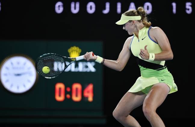 (260125) -- MELBOURNE, Jan. 25, 2026 -- Mirra Andreeva hits a return during the women s singles 4th round match between Elina Svitolina of Ukraine and Mirra Andreeva of Russia at the Australian Open tennis tournament in Melbourne, Australia, Jan. 25, 2026. (Photo by Xinhua) (SP)AUSTRALIA-MELBOURNE-TENNIS-AUSTRALIAN OPEN-WOMEN S SINGLES WangxShen 