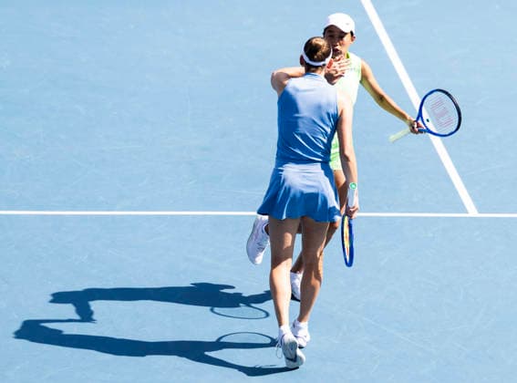 (260125) -- MELBOURNE, Jan. 25, 2026 -- Elise Mertens Zhang Shuai (back) celebrate scoring during the women s doubles 2nd round match between Elise Mertens (Belgium) Zhang Shuai (China) and Iva Jovic (the United States) Victoria Mboko (Canada) at the Australian Open tennis tournament in Melbourne, Australia, Jan. 25, 2026. (Photo by Xinhua) (SP)AUSTRALIA-MELBOURNE-TENNIS-AUSTRALIAN OPEN-WOMEN S DOUBLES HuxJingchen 