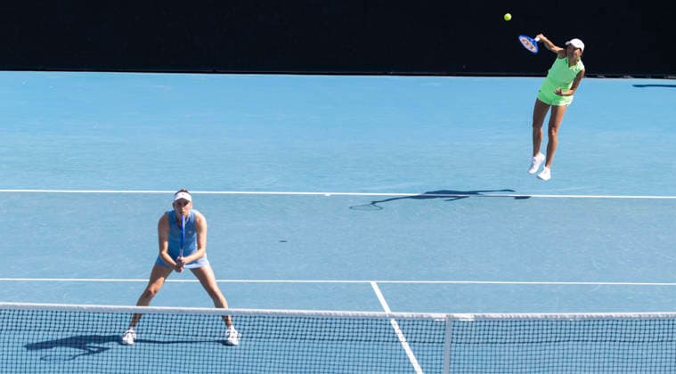 (260125) -- MELBOURNE, Jan. 25, 2026 -- Elise Mertens Zhang Shuai (R) compete during the women s doubles 2nd round match between Elise Mertens (Belgium) Zhang Shuai (China) and Iva Jovic (the United States) Victoria Mboko (Canada) at the Australian Open tennis tournament in Melbourne, Australia, Jan. 25, 2026. (Photo by Xinhua) (SP)AUSTRALIA-MELBOURNE-TENNIS-AUSTRALIAN OPEN-WOMEN S DOUBLES HuxJingchen 