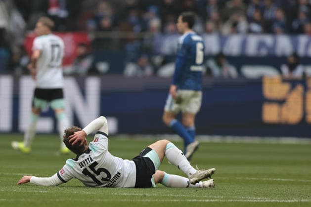 Naatan Skytta 1 FC Kaiserslautern lies on the ground after a tackle during the match of the 2 Bundesliga season 2025 26 FC Schalke 04 1 FC Kaiserslautern Copyright Thomas Pakusch