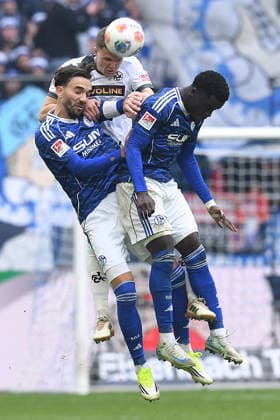 Soccer 2 Bundesliga 19 Matchday FC Schalke 04 1 FC Kaiserslautern on 25 01 2026 at the Veltins Arena in Gelsenkirchen Kenan Karaman Schalke , left Christian Gomis Schalke , right Fabian Kunze Kaiserslautern , in the back DFL regulations prohibit any use of photographs as image sequences and or quasi video xRx