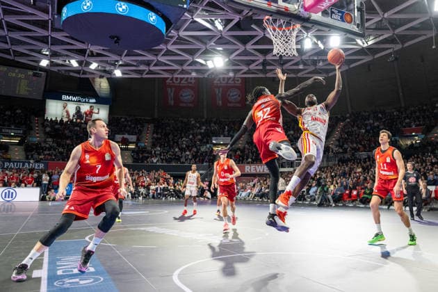 Johannes Voigtmann 7 FC Bayern Basketball , Wenyen Gabriel 32 FC Bayern Basketball in duel with Eddy Edigin 27 Fitness First Wuerzburg Baskets , FC Bayern Basketball vs Fitness First Wuerzburg Baskets, BBL, Main Round, 25 01 2026 Munich Bavaria Germany Copyright: xkolbert-press UlrichxGamelx