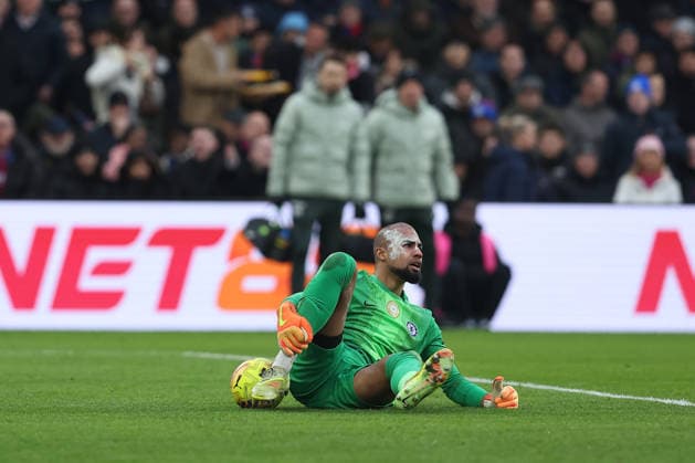 25th January 2026; Selhurst Park, Selhurst, London, England; Premier League Football, Crystal Palace versus Chelsea; goalkeeper Robert Sanchez of Chelsea complains about being barged onto the ground while holding the ball by Jefferson Lerma of Crystal Palace  KatiexChan