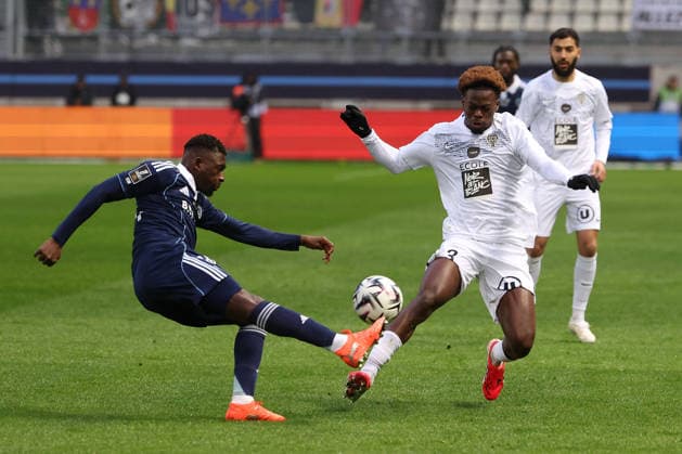 FBL FRA La LIGUE1 Paris FC Angers SCO Hamari Traore Paris FC , Jacques Ekomie Angers SCO Battles for the Ball during the French L1 football match between Paris FC an Angers SCO at Stade Jean Bouin on January 25, 2026 in Paris France Copyright: JoaquimxFerreira