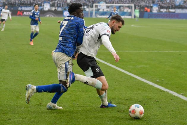 from left in duel Christian Gomis Schalke 7 Atanas Chernev Kaiserslautern 16 25 01 2026 Soccer FC Schalke 04 vs 1 FC Kaiserslautern, Veltins Arena, Gelsenkirchen, DFB DFL REGULATIONS PROHIBIT ANY USE OF PHOTOGRAPHS AS IMAGE SEQUENCES AND OR QUASI VIDEO Copyright: xpepphotox xSaschaxWeizx pep00321, pep_20260125_hm_262171