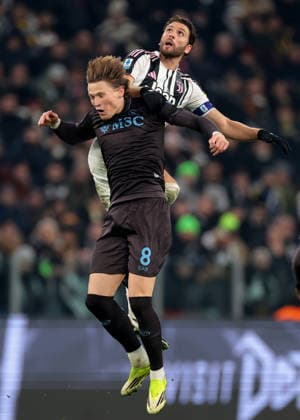 Turin, Italy, 25th January 2026. Manuel Locatelli of Juventus leaps for an aerial ball with Scott McTominay of SSC Napoli during the Juventus vs Napoli Serie A match at Allianz Stadium, Turin. Picture credit should read: Jonathan Moscrop Sportimage EDITORIAL USE ONLY. No use with unauthorised audio, video, data, fixture lists, club league logos or live services. Online in-match use limited to 120 images, no video emulation. No use in betting, games or single club league player publications. SPI_160_JM_JUVE_NAPOLI_ SPI-4417-0160