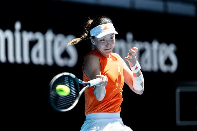 (260126) -- MELBOURNE, Jan. 26, 2026 -- Wang Xinyu of China hits a return during the women s singles 4th round match between Wang Xinyu of China and Amanda Anisimova of the United States at the Australian Open tennis tournament in Melbourne, Australia, Jan. 26, 2026. (Photo by Xinhua) (SP)AUSTRALIA-MELBOURNE-TENNIS-AUSTRALIAN OPEN-WOMEN S SINGLES HuxJingchen 