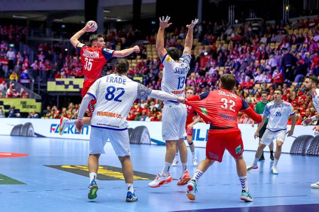26 01 2026, Handball, Men s EHF EURO 2026, Norway Portugal, Jyske Bank Boxen in Herning, Denmark, Main Round Patrick Helland Anderson Norway 35 throws the ball on goal past Luis Diogo Sousa Frade Portugal 82 Rocha Nogueira Portugal 13 Thomas Alfred Solstad Norway 32 Denmark