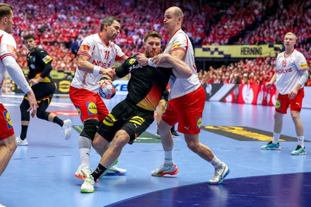 26 01 2026, Handball, Men s EHF EURO 2026, Germany Denmark, Jyske Bank Boxing in Herning, Denmark, Main Round Johannes Golla Germany 04 in a duel against Rasmus Lauge Schmidt Denmark 11 Simon Hald Jensen Denmark 34 Denmark