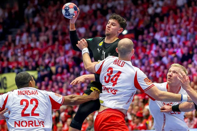 26 01 2026, Handball, Men s EHF EURO 2026, Germany Denmark, Jyske Bank Boxen in Herning, Denmark, Main Round Marko Grgic Germany 71 in a duel against Mads Mensah Larsen Denmark 22 Simon Hald Jensen Denmark 34 Magnus Saugstrup Jensen Denmark 15 Denmark
