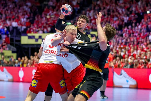 26 01 2026, Handball, Men s EHF EURO 2026, Germany Denmark, Jyske Bank Boxing in Herning, Denmark, Main Round Marko Grgic Germany 71 and Johannes Golla Germany 04 in a duel against Niclas Vest Kirkelokke Denmark 03 Magnus Saugstrup Jensen Denmark 15 Denmark