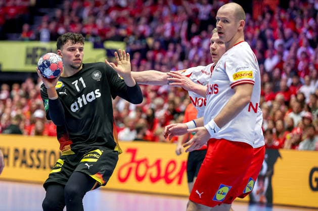 26 01 2026, Handball, Men s EHF EURO 2026, Germany Denmark, Jyske Bank Boxen in Herning, Denmark, Main Round Marko Grgic Germany 71 in a duel against Magnus Saugstrup Jensen Denmark 15 Simon Hald Jensen Denmark 34 Denmark