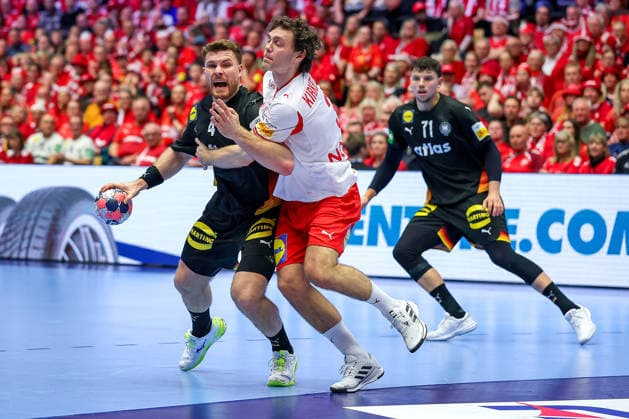 26 01 2026, Handball, Men s EHF EURO 2026, Germany Denmark, Jyske Bank Boxing in Herning, Denmark, Main Round Johannes Golla Germany 04 in duel against Niclas Vest Kirkelokke Denmark 03 Denmark