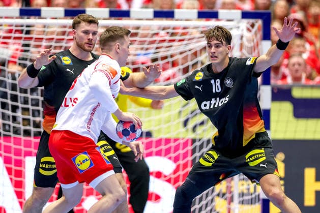 26 01 2026, Handball, Men s EHF EURO 2026, Germany Denmark, Jyske Bank Boxen in Herning, Denmark, Main Round Johannes Golla Germany 04 Julian Köster Germany 18 defend against Lasse Bredekjaer Andersson Denmark 28 Denmark