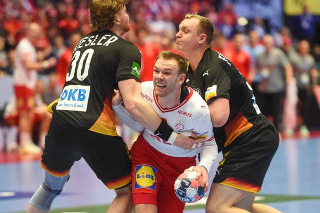 Handball I Men I European Championship 2026 I Main Round Group I I Matchday 3 I Germany Denmark I 26 01 2026 from left Tom Kiesler 30, Germany , Mathias Gidsel 19, Denmark , Justus Fischer 54, Germany Copyright: xLobeca JanxKirschnerx