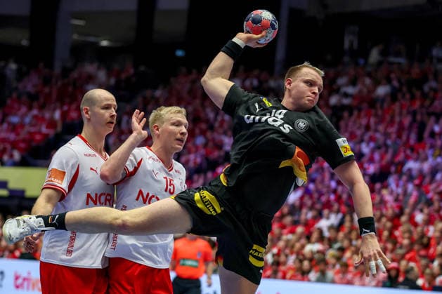 26 01 2026, Handball, Men s EHF EURO 2026, Germany Denmark, Jyske Bank Boxen in Herning, Denmark, Main Round Justus Fischer Germany 54 in a duel against Simon Hald Jensen Denmark 34 Magnus Saugstrup Jensen Denmark 15 Denmark