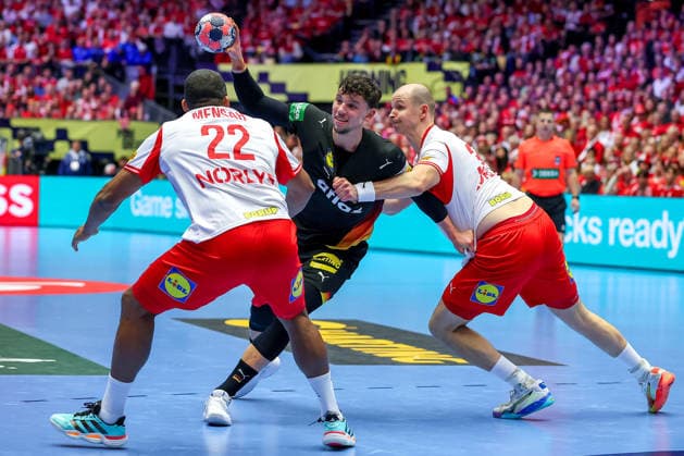 26 01 2026, Handball, Men s EHF EURO 2026, Germany Denmark, Jyske Bank Boxen in Herning, Denmark, Main Round Marko Grgic Germany 71 in a duel against Mads Mensah Larsen Denmark 22 Magnus Saugstrup Jensen Denmark 15 Denmark