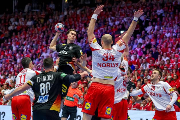 26 01 2026, Handball, Men s EHF EURO 2026, Germany Denmark, Jyske Bank Boxen in Herning, Denmark, Main Round Miro Schluroff Germany 05 throws the ball on goal against Simon Hald Jensen Denmark 34 Mathias Gidsel Denmark 19 Denmark