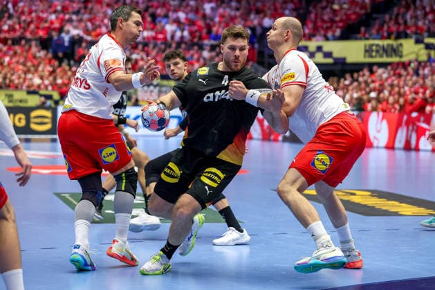 26 01 2026, Handball, Men s EHF EURO 2026, Germany Denmark, Jyske Bank Boxing in Herning, Denmark, Main Round Johannes Golla Germany 04 in a duel against Rasmus Lauge Schmidt Denmark 11 Simon Hald Jensen Denmark 34 Denmark
