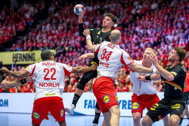 26 01 2026, Handball, Men s EHF EURO 2026, Germany Denmark, Jyske Bank Boxen in Herning, Denmark, Main Round Marko Grgic Germany 71 in a duel against Mads Mensah Larsen Denmark 22 Simon Hald Jensen Denmark 34 Magnus Saugstrup Jensen Denmark 15 Denmark