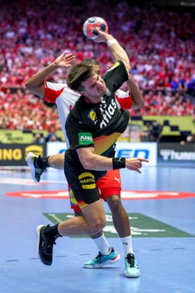 26 01 2026, Handball, Men s EHF EURO 2026, Germany Denmark, Jyske Bank Boxing in Herning, Denmark, Main Round Renars Uscins Germany 23 in duel against Mads Mensah Larsen Denmark 22 Denmark