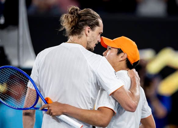 (260127) -- MELBOURNE, Jan. 27, 2026 -- Alexander Zverev (L) of Germany and Learner Tien of the United States greet each other after the men s singles quarterfinal match between Alexander Zverev of Germany and Learner Tien of the United States at the Australian Open tennis tournament in Melbourne, Australia, Jan. 27, 2026. (Photo by Xinhua) (SP)AUSTRALIA-MELBOURNE-TENNIS-AUSTRALIAN OPEN-MEN S SINGLES-QUARTERFINAL HuxJingchen 
