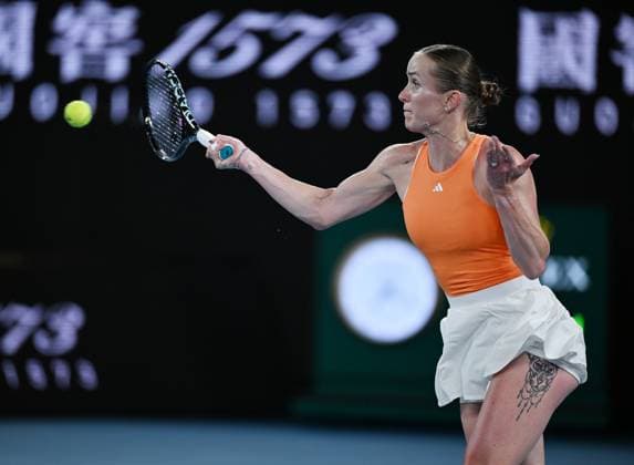 (260127) -- MELBOURNE, Jan. 27, 2026 -- Elina Svitolina hits a return during the women s singles quarterfinal match between Coco Gauff of the United States and Elina Svitolina of Ukraine at the Australian Open tennis tournament in Melbourne, Australia, Jan. 27, 2026. (Photo by Xinhua) (SP)AUSTRALIA-MELBOURNE-TENNIS-AUSTRALIAN OPEN-WOMEN S SINGLES-QUARTERFINAL WangxShen 